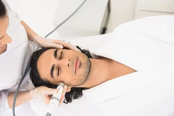 Gentleman enjoying a facial makeover.
